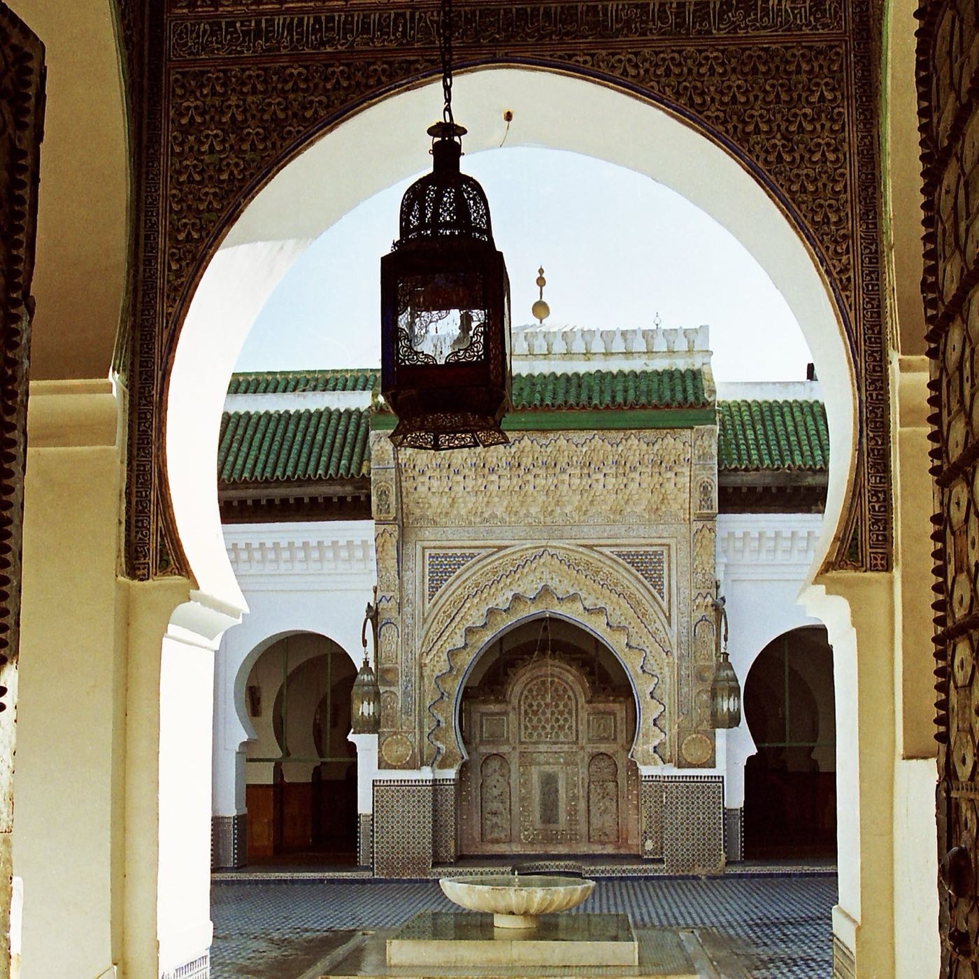 An Islamic architectural arch framing a place of learning